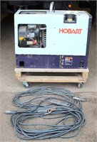 Lot # 5008.  Hobart Champion 10,0000 Portable Welder/Generator, engine runs good (needs a new circuit card assembly).   Absentee bidding available on this item.  Click catalog tab for more information.