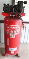 Lot # 5024.  Husky Upright Air Comprssor, 60-gal.   Absentee bidding available on this item.  Click catalog tab for more information.