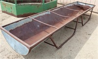 Lot 5031 - Long Cattle Feeder #1.  Absentee bidding available on this item. Click catalog tab for more information & pictures.