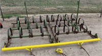 Lot 5039 - JD Springtooth Cultivator.  Absentee bidding available on this item. Click catalog tab for more information & pictures.