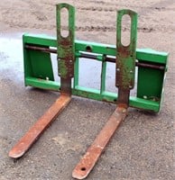 Lot 8011- JD Tractor Front Fork Attachment  Absentee bidding available on this item. Click catalog tab for more information & pictures.