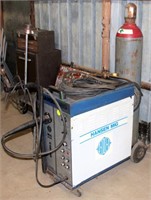 Lot 8017- Hansen Mig Welder w/Tank   Absentee bidding available on this item. Click catalog tab for more information & pictures.
