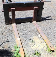ot 5013- Fork Attachment for Front End Loader Bucket    Absentee bidding available on this item. Click catalog tab for more information & pictures.